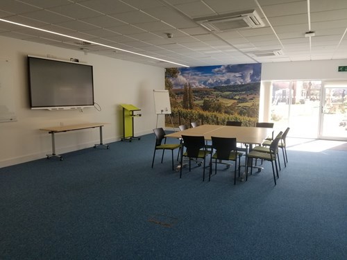 Meeting room with table and chairs