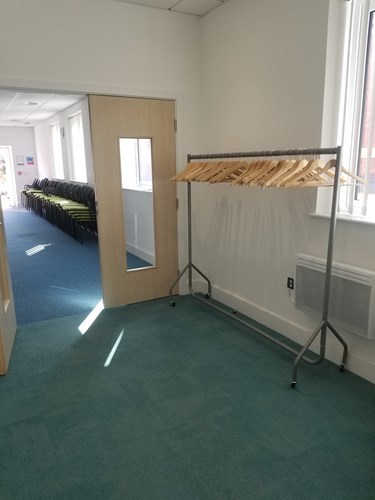 Foyer with clothing rack